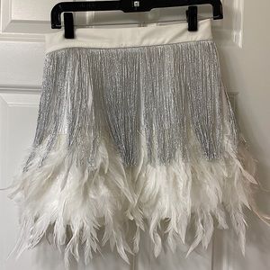 White skirt with feathers and fringe!